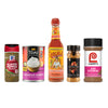 Five different spice and condiment bottles from McCormick Thai Kitchen Cholula Lawrys and McCormick.