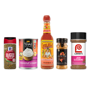 Five different spice and condiment bottles from McCormick Thai Kitchen Cholula Lawrys and McCormick.