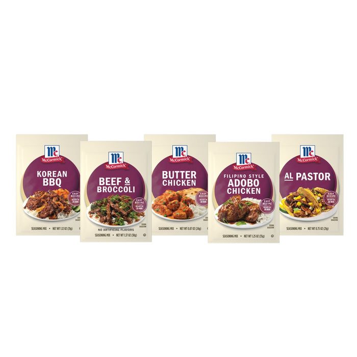 A variety of McCormick seasoning mixes including Korean BBQ Beef &amp; Broccoli Butter Chicken Filipino Style Adobo Chicken and Al Pastor are displayed.