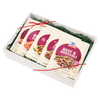 A gift box containing McCormick seasoning packets for various dishes.