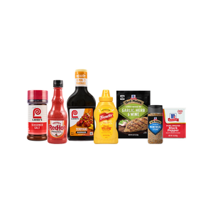 A collection of McCormick and subsidiary brand products, including Lawry's Seasoned Salt, Frank's RedHot, Lawry's Teriyaki Marinade, French's Mustard, and various McCormick Grill Mates and pepper seasonings, are arranged on a black background.