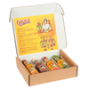 An open gift box displays four different bottles of Cholula Hot Sauce, including Chili Garlic, Extra Hot, Sweet Habanero, and Green Pepper flavors.