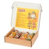 An open cardboard gift box displays four different bottles of Cholula Hot Sauce, including Chili Garlic, Extra Hot, Sweet Habanero, and Green Pepper flavors, against a branded interior.