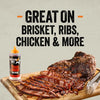 A bottle from the Mission Bbq Iw Dtc Pack Bundle Dtcmbbqvp sits next to a sliced brisket drizzled with the Texas Twang BBQ sauce to show it is great on brisket, ribs, chicken, and more.