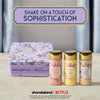 A collection of McCormick's Bridgerton finishing sugars, including Strawberries &amp; Cream, Sweet Lemon, and Lavender Vanilla, are displayed with a Bridgerton-themed tin.