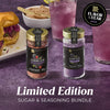 A promotional image of the Mccormick Gourmet Dtc Bundle Foty shows the 2026 Flavor of the Year Sweet &amp; Smoky Black Currant Seasoning and Black Currant Finishing Sugar arranged with sliders and purple cocktails to suggest uses.