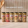The McCormick Finishing Sugar Bundle, featuring six dessert-flavored finishing sugars like Cinnamon Roll and Strawberry, is displayed on a kitchen counter with text above reading, The Perfect Gift!