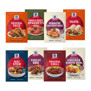 An assortment of eight McCormick seasoning mix packets, including Original Taco, Beef Stew, and Original Chili, are displayed in two rows, showcasing the variety in the Dtcmckvbeasymealsdrmbundle.