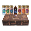 A Dtcmckvb Harry Potter X Mccormick Back To Hogwarts Finishing Sugars And Extract Trunk Bundle featuring a decorative brown trunk and six themed bottles including vanilla extract and various flavored finishing sugars like Pumpkin Pasty and Chocolate Frog.