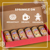 A festive holiday infographic showcases the Dtcmckvb Winter Finishing Sugars Gift Set featuring six McCormick flavors including Pumpkin Spice, Cranberry, English Toffee, Candy Cane, Sugar Cookie, and Dulce De Leche to sprinkle on breakfast, drinks, and desserts.