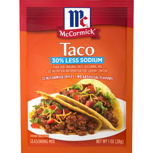 McCormick Taco seasoning mix packet with a taco on a white background
