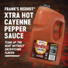 A gallon jug of Franks RedHot Xtra Hot Cayenne Pepper Sauce.