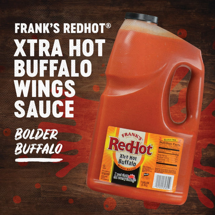 A gallon jug of Franks RedHot Xtra Hot Buffalo Wing Sauce.