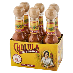 A six-pack of Cholula Hot Sauce bottles in its branded yellow cardboard packaging.