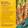 Grilled Mexican street corn with Cholula hot sauce, cotija cheese, and lime wedges.