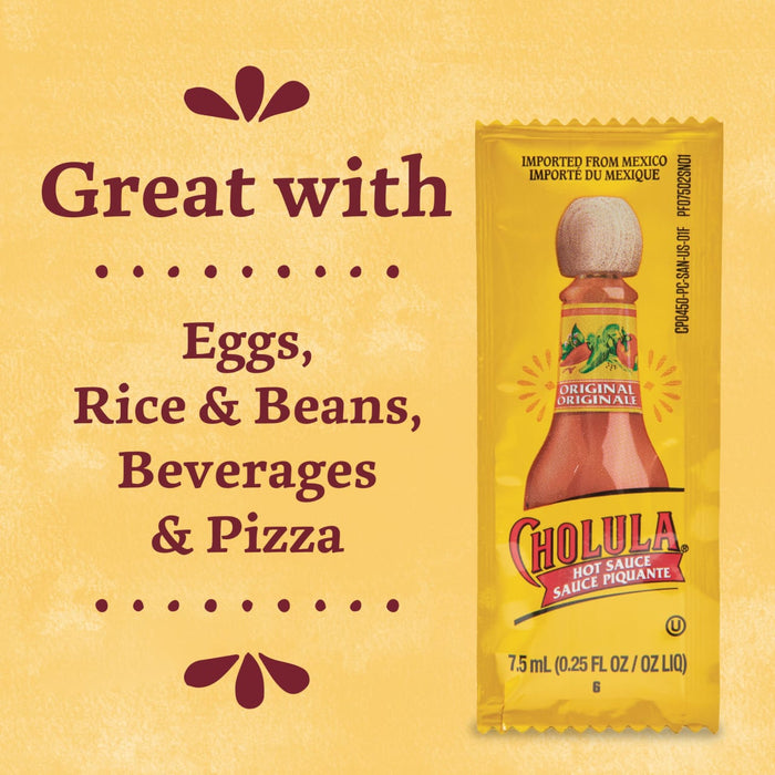 A packet of Cholula Original Hot Sauce with text that says Great with Eggs Rice &amp; Beans Beverages &amp; Pizza.