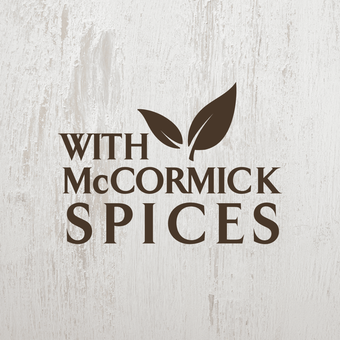 A logo for McCormick Spices with the words With McCormick Spices and a leaf design.