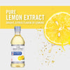 A bottle of McCormick Pure Lemon Extract with a lemon slice and lemon zest.