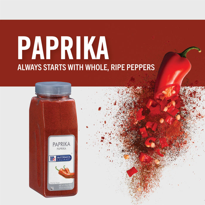 A jar of McCormick Culinary Paprika with a red pepper and paprika powder spilling out.