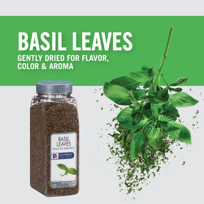 A jar of McCormick Culinary Basil Leaves with fresh basil leaves falling from the top.
