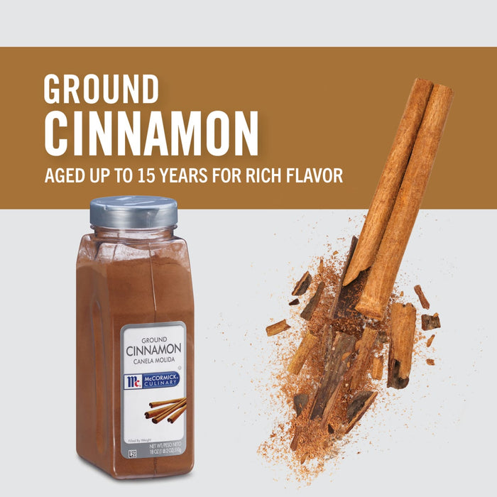 A jar of McCormick Culinary Ground Cinnamon with cinnamon sticks and powder scattered around it.
