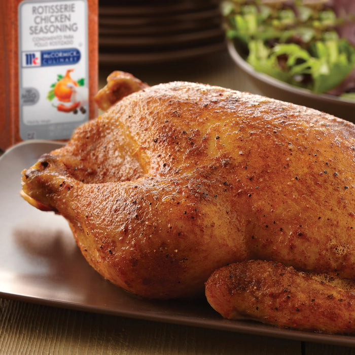 A roasted chicken seasoned with McCormick Culinary Rotisserie Chicken Seasoning.