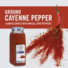 A jar of McCormick Culinary Ground Cayenne Pepper with a red chili pepper bursting into a pile of cayenne pepper.