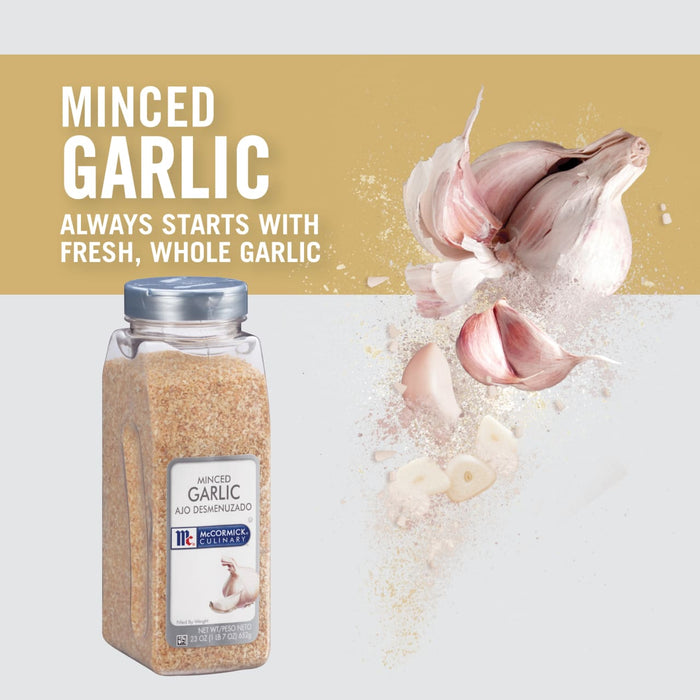 A jar of McCormick Culinary Minced Garlic with whole garlic cloves in the background.