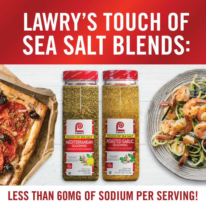 Two bottles of Lawrys Touch of Sea Salt blends one Mediterranean and one Roasted Garlic with a plate of food in the background.