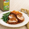 A plate of pork tenderloin with green beans and a baked sweet potato seasoned with Perfect Pinch Signature Seasoning Blend.