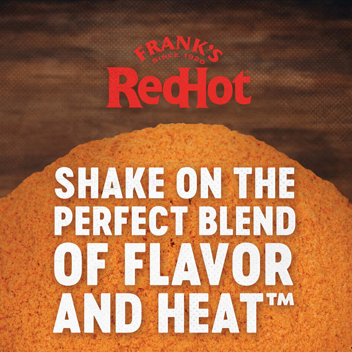 Frank\s RedHot logo with the tagline Shake on the perfect blend of flavor and heat over a pile of orange seasoning.