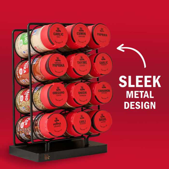 A sleek metal spice rack from The Spice Lab displays a variety of spices in red-lidded jars.