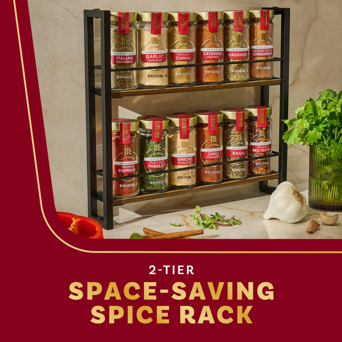 A two-tier space-saving spice rack filled with various spices is displayed on a kitchen counter.