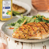 A plate of grilled chicken with a side salad seasoned with McCormick Lemon n Herb seasoning.