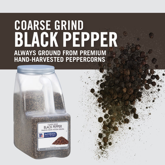 A container of McCormick Coarse Grind Black Pepper with peppercorns spilling out.