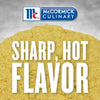 McCormick Culinary brand logo with a pile of yellow mustard powder and the text Sharp Hot Flavor in white.