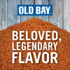 A pile of Old Bay seasoning with the text Beloved Legendary Flavor on top.