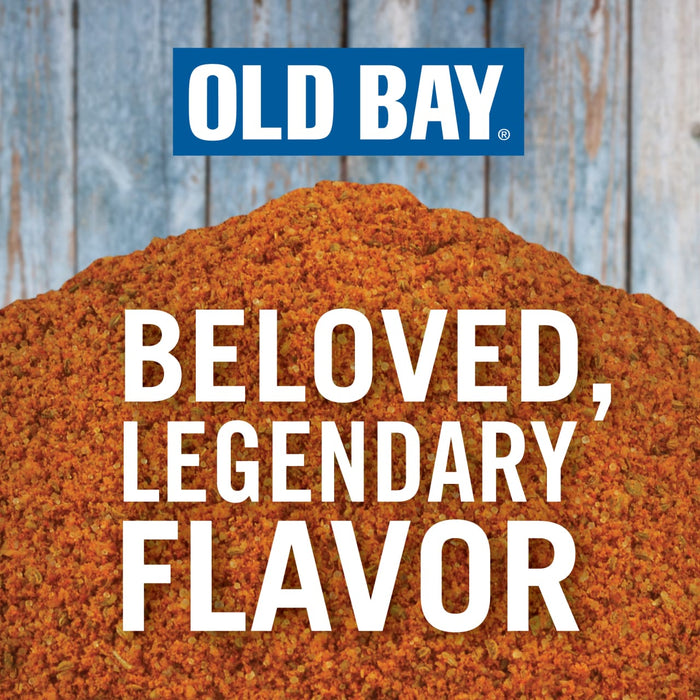 A pile of Old Bay seasoning with the text Beloved Legendary Flavor on top.