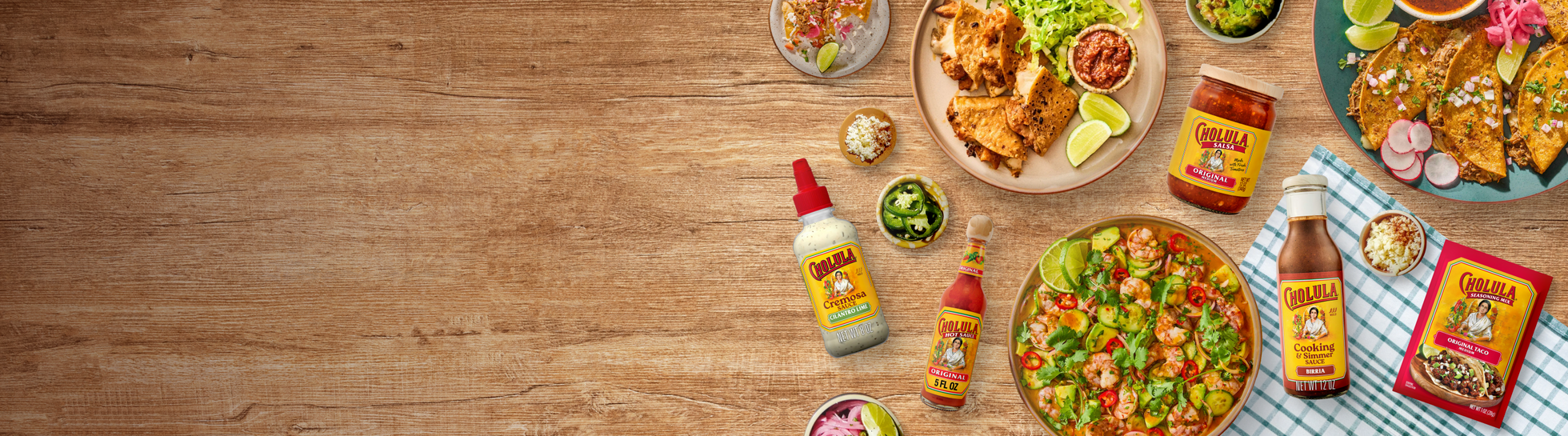 Wooden table with food and Guacadoo products
