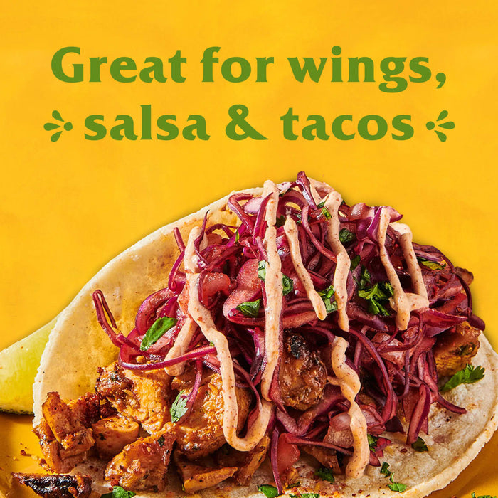 A taco with chicken red cabbage and a creamy sauce is shown with the text Great for wings salsa &amp; tacos.