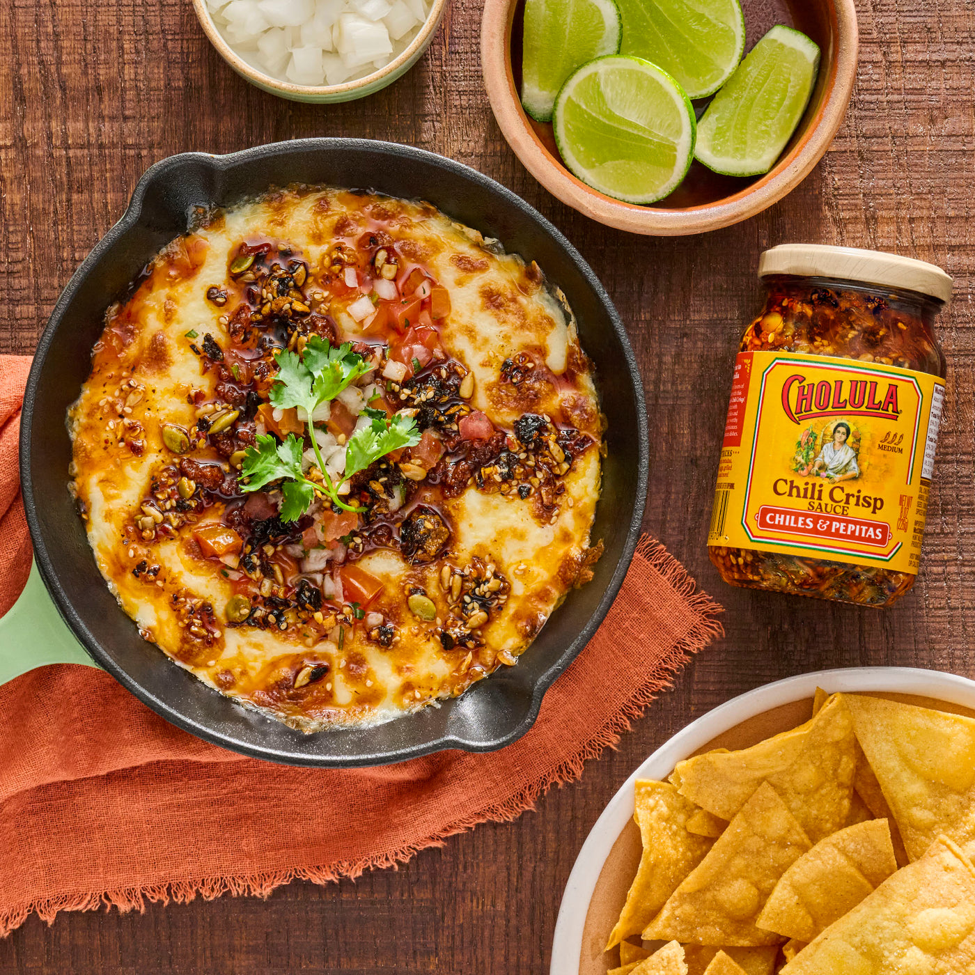 queso fundido with cholula chili crisp sauce