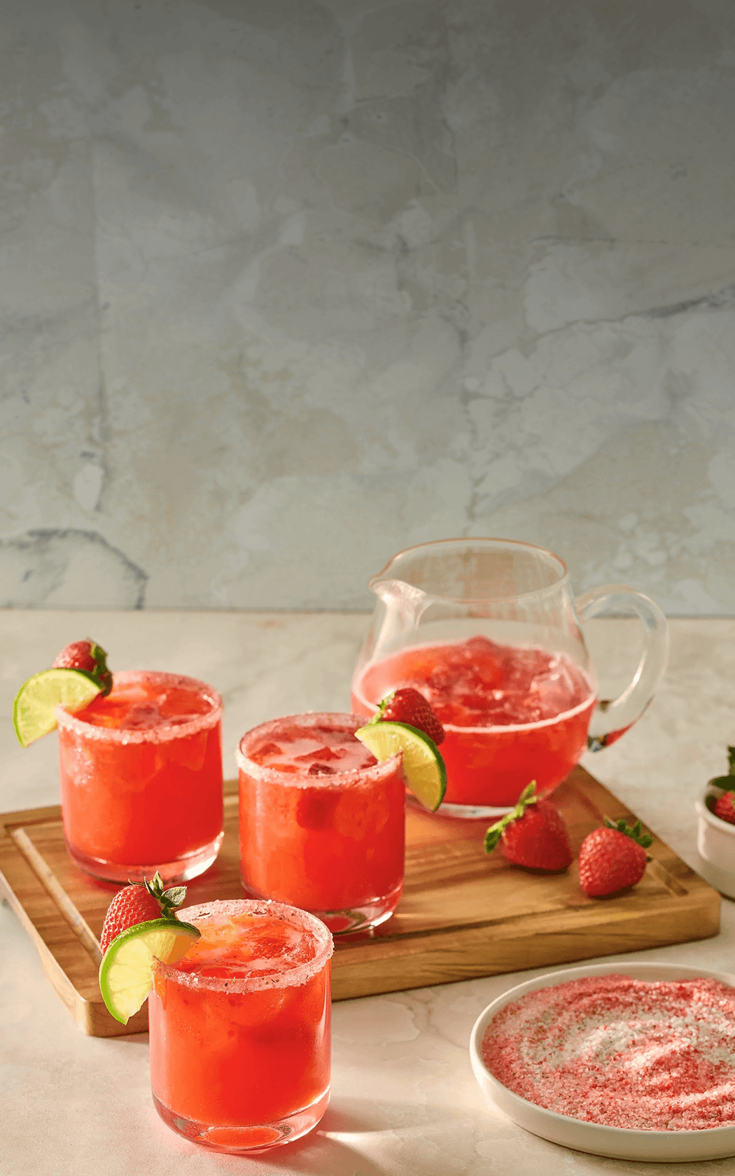 Red punch cocktails on a wooden board