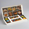 A Grill Mates gift box containing a variety of spice blends and seasonings for grilling.