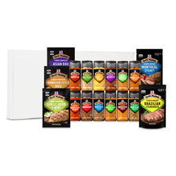 A variety of Grill Mates seasonings and marinades are displayed in front of a white box.