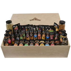 A large wooden crate filled with a comprehensive assortment of McCormick seasonings and marinades belonging to the Dtc Grill Mates Dtcmccgmvp Bundle including varieties like Montreal Steak and Applewood Smoke.