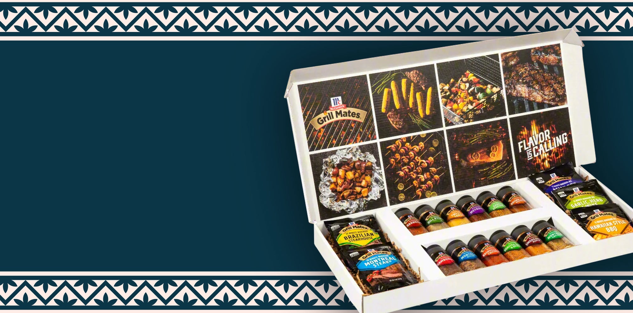 Assorted spice and seasoning set in a decorative box on a blue background with a white border.