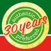 A logo with a green circle with the words authentic and preferred around a yellow circle with the words 30 years in red.