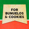 A vintage-style banner with the text FOR BUNUELOS &amp; COOKIES in black on a yellow background.