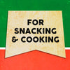 A vintage-style banner with the text FOR SNACKING &amp; COOKING on a yellow background.