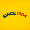 The logo displays the text SINCE 1904 in blue and red on a yellow background.